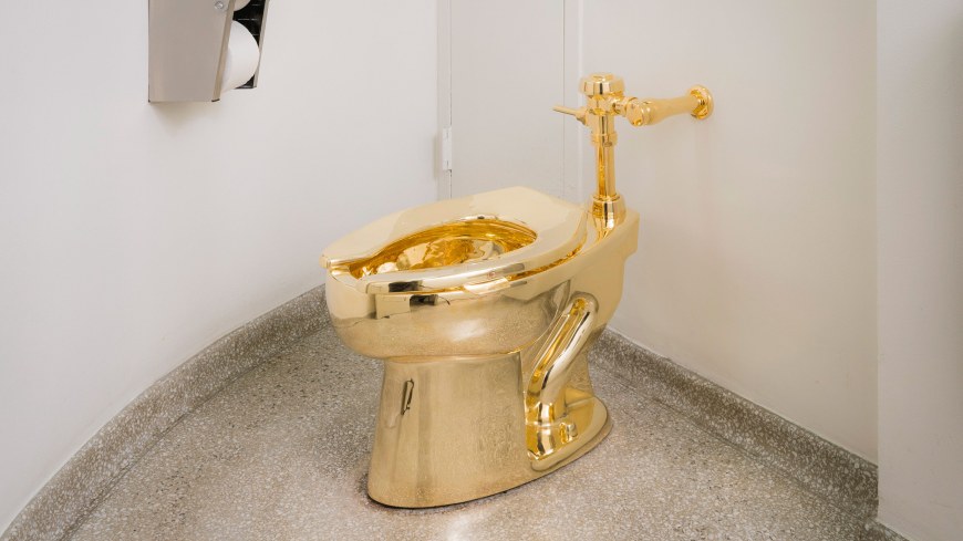 Maurizio Cattelan, America, 2016; installation view; 18-karat gold; image via the Guggenheim