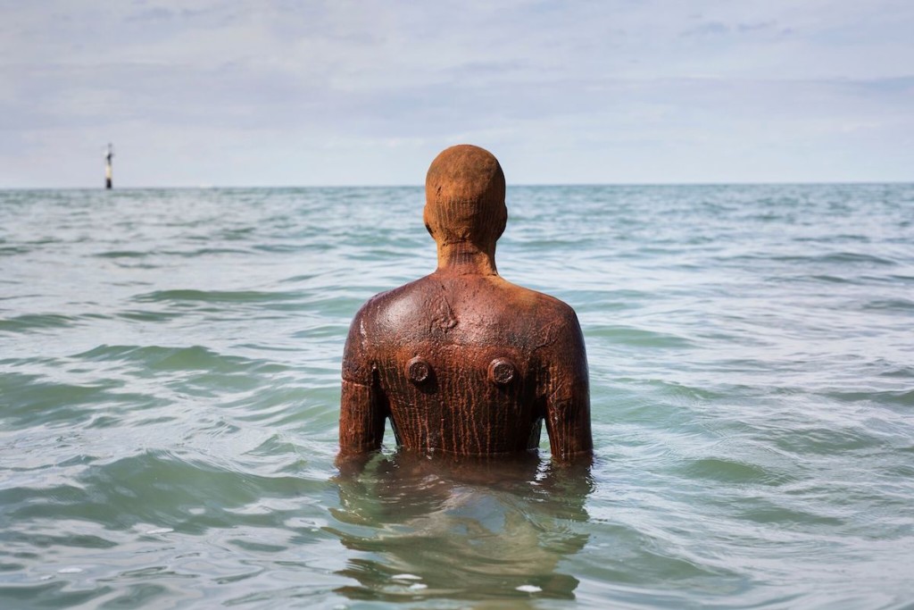 Antony Gormley, ANOTHER TIME XXI, 2013, © Antony Gormley, on Fulsam Rock on the Margate foreshore, photography by Thierry Bal