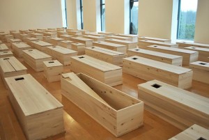 Partial installation view of Yoko Ono's Ex It (100 coffins, 100 trees) at Musée d’Art Contemporain in Lyon, 2016; image via MAC Lyon